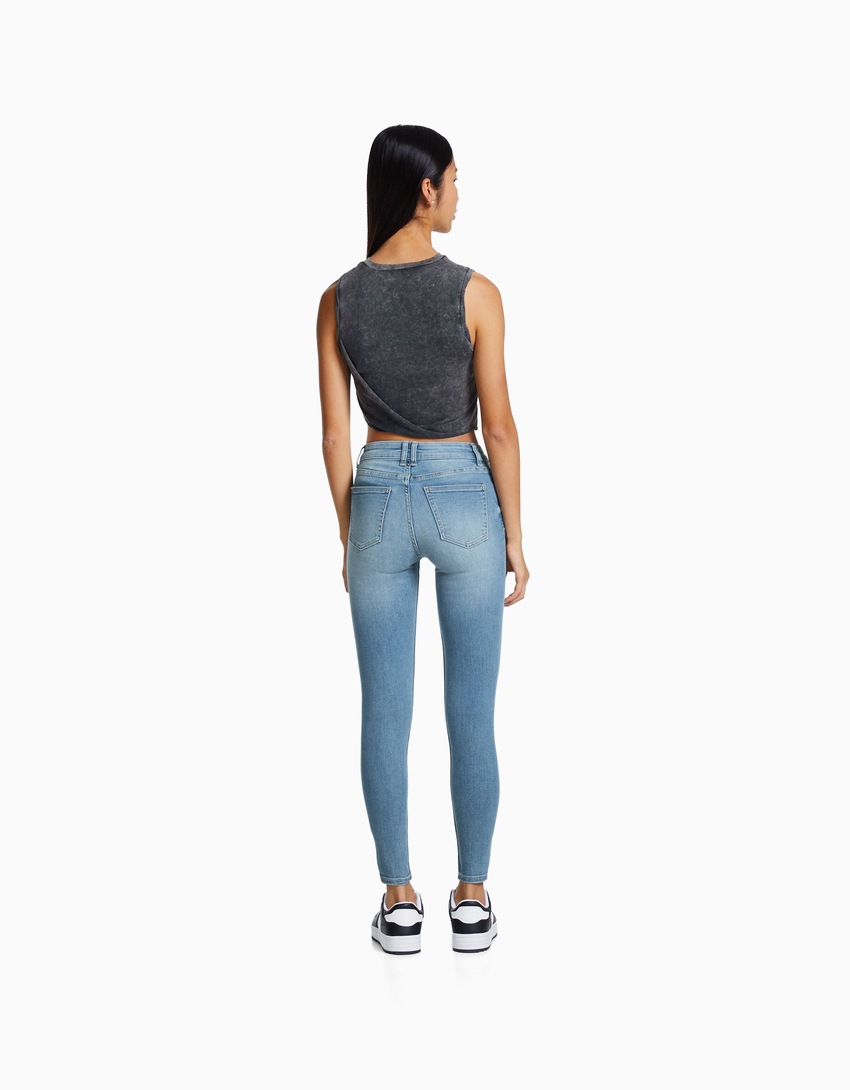 calça jeans skinny vintage de cintura baixa