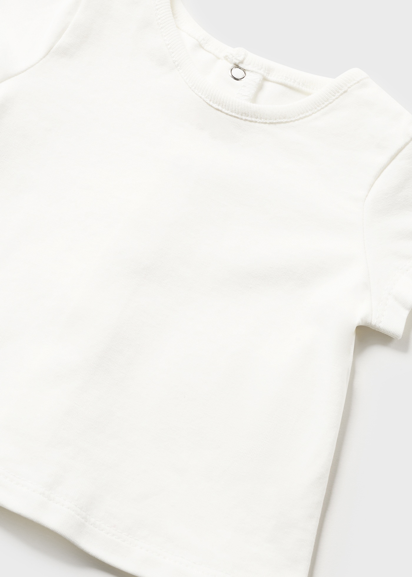 Conjunto de duas peças em malha de algodão sustentável para recém-nascidos.