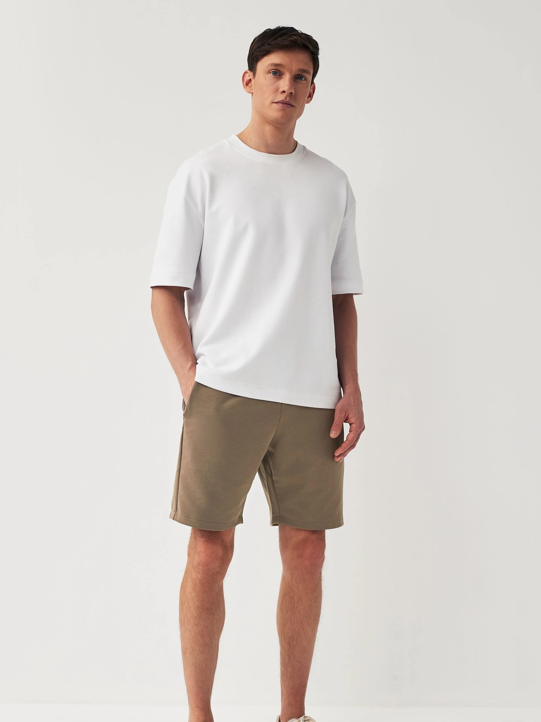 Donker kiezelkleurig - Jersey shorts met ritszakje