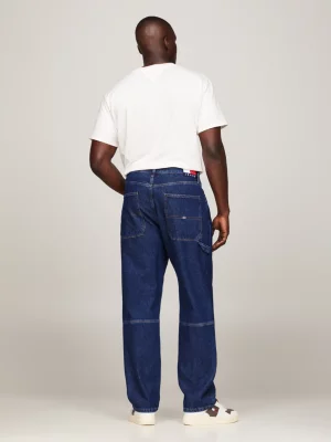 Calça jeans estilo skatista, modelagem ampla, ideal para trabalho.