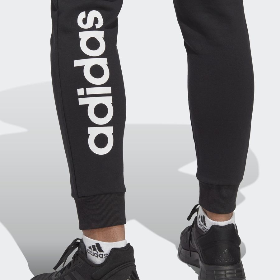 Adidas Pantalon en molleton à chevilles élastiques Essentials Linear