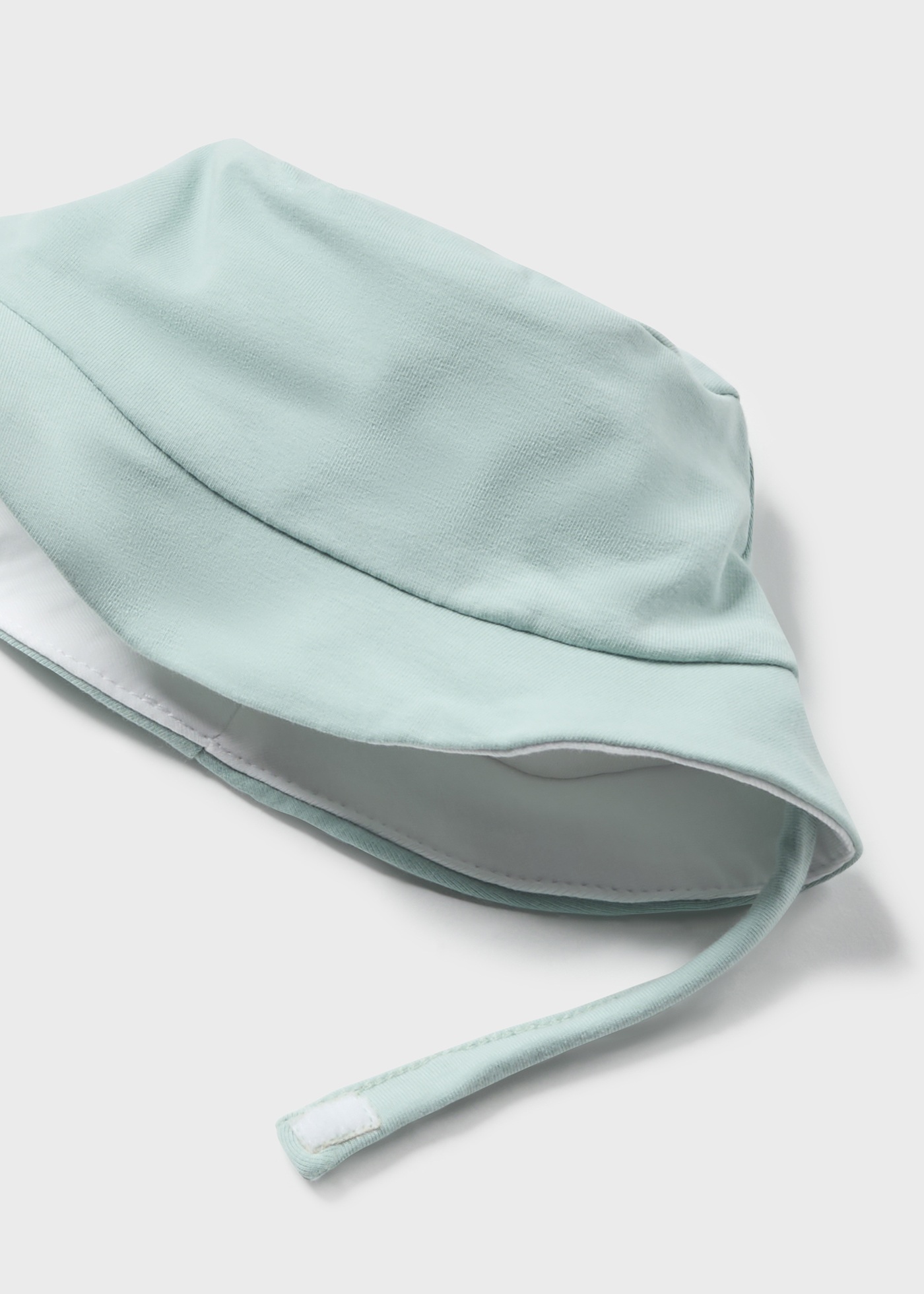 Macacão infantil Better Cotton Jade com gorro.