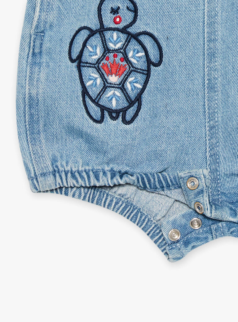 Barboteuse en denim bleu à broderies tortues