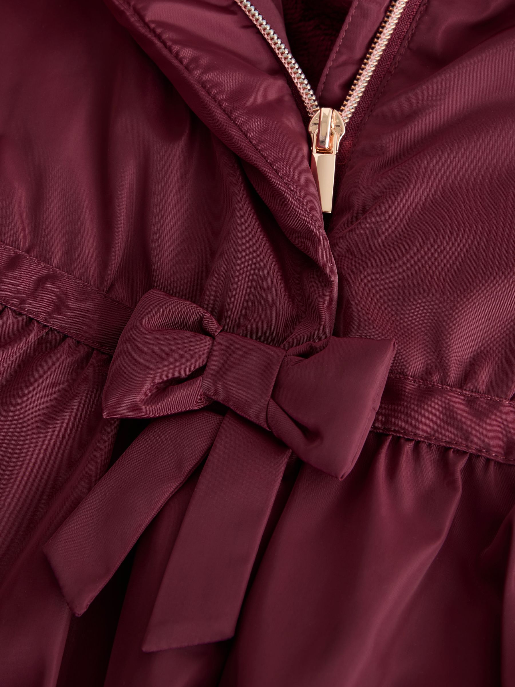 Bordeauxrood - Regenbestendige jas met rok en strikdetail (3mnd -7jr)