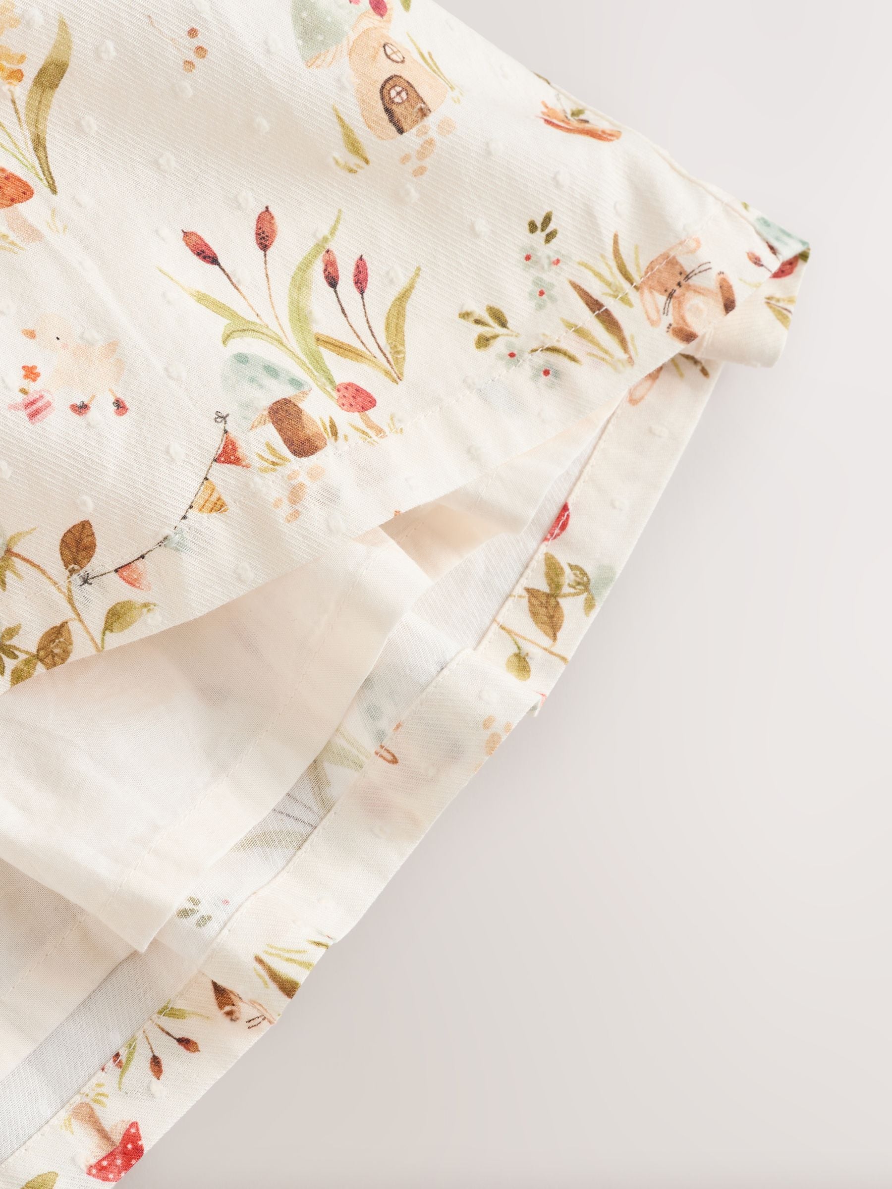 Crème bloemenprint/personage - Collar Baby Dress (0mths-2yrs)