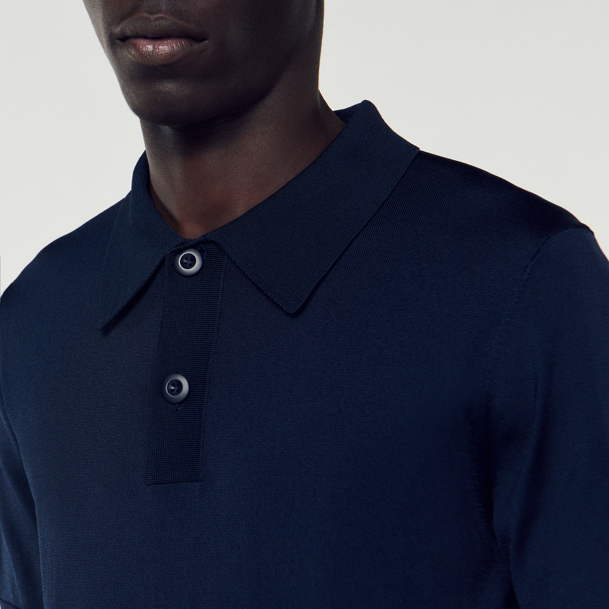 Polo en maille á manches courtes