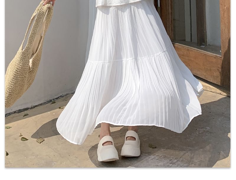 Tel tot 10 - Hoge taille effen maxi A-lijn rok