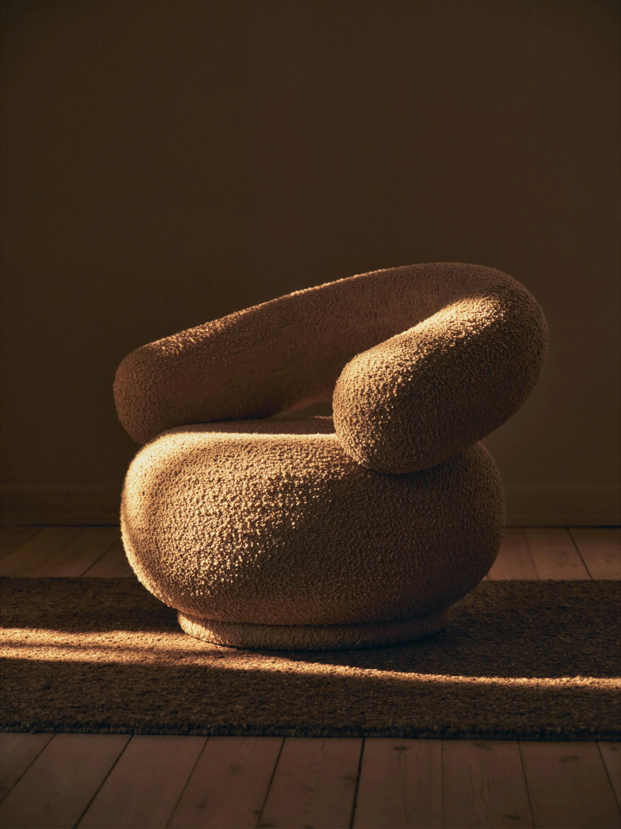Bouclé loungefauteuil Orbo