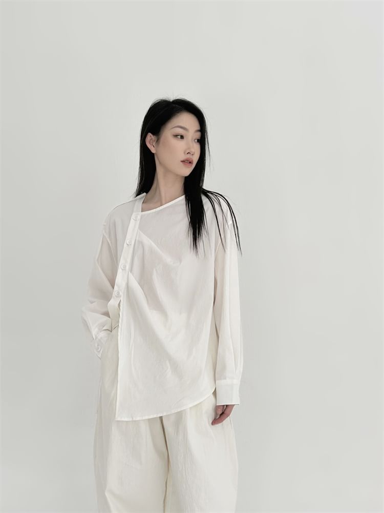 SIMPLE BLACK - Effen asymmetrische blouse