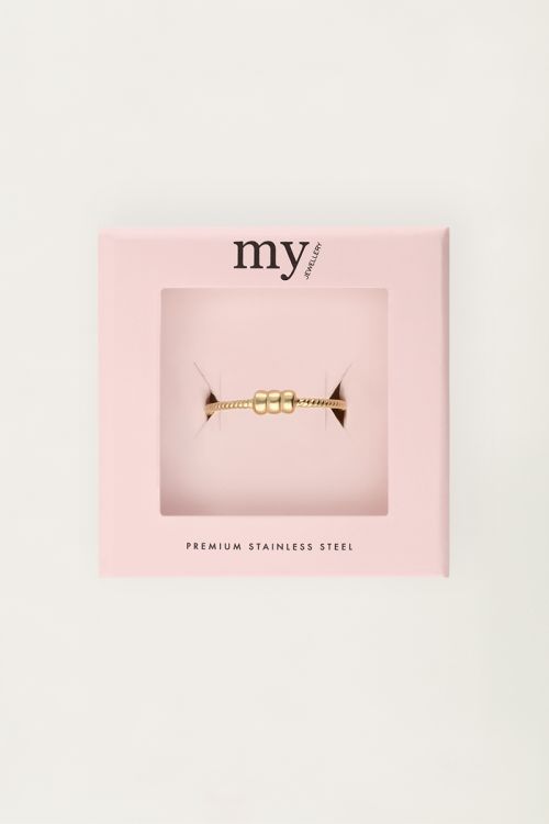 Minimalistische ring met structuur en drie bolletjes