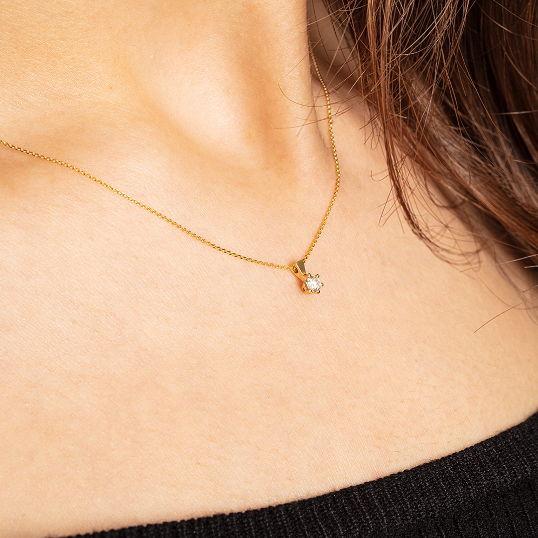 Collier mit Anhänger 750/18 K Gelbgold mit Diamant 0.10 ct H/si
