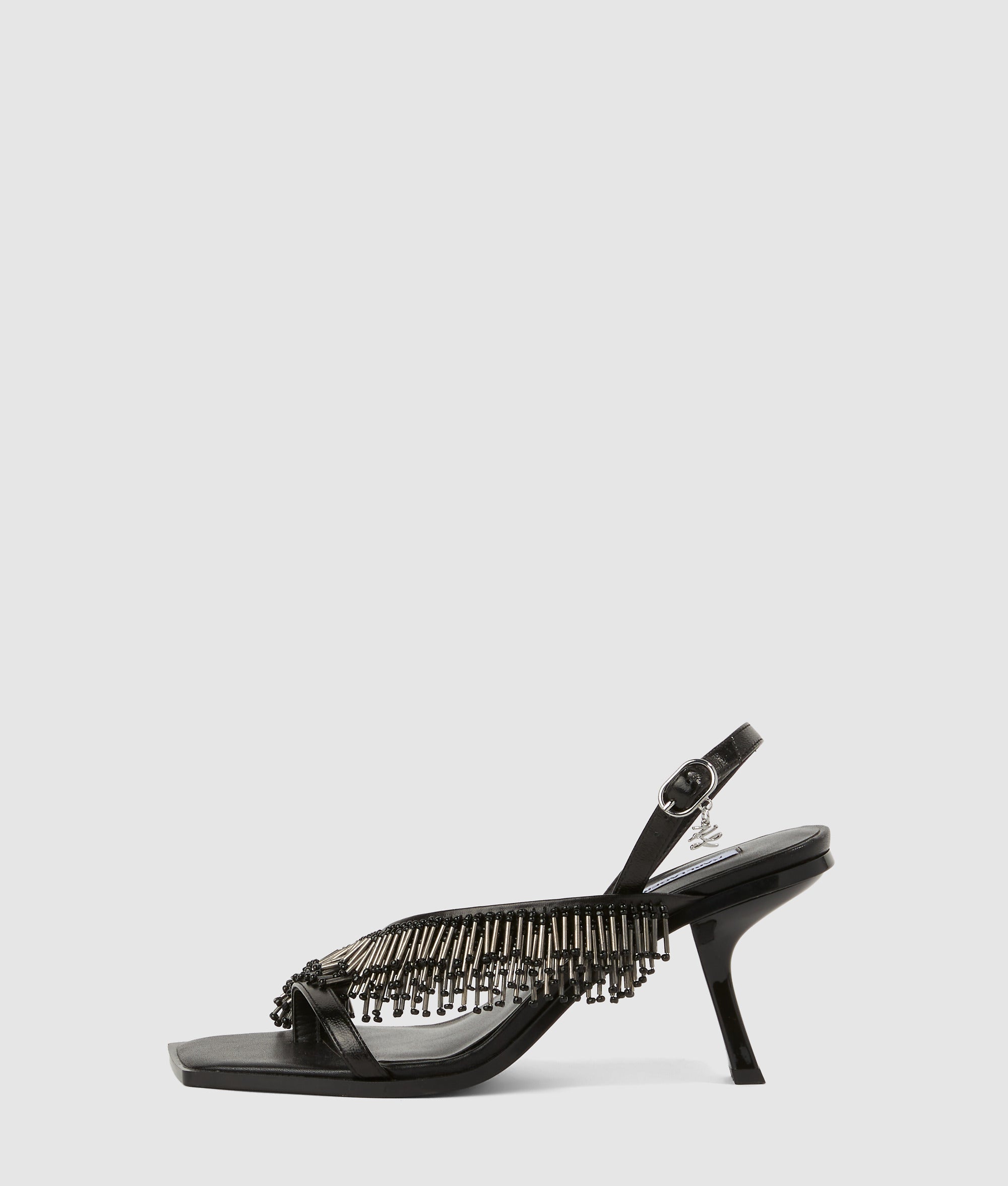 Karmel slingbacks met franje en hak