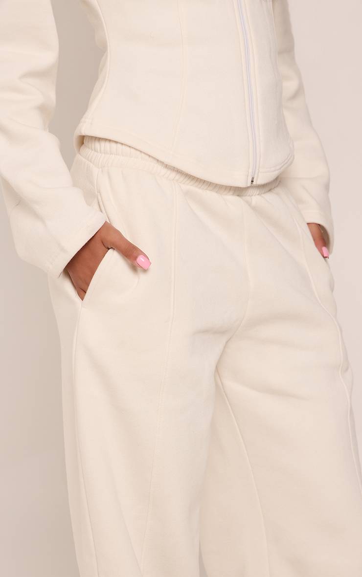Crème Jogging Jambe Droite Avec Détails De Coutures