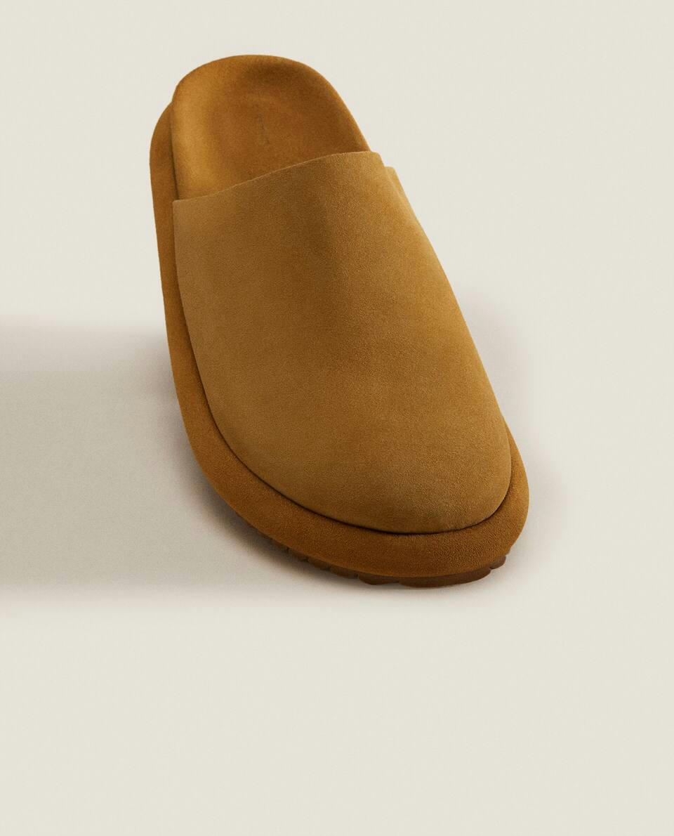 Chinelo mule de couro com detalhe na sola