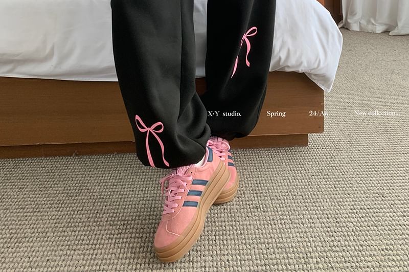 monroll - Harem-joggingbroek met trekkoord en strikprint
