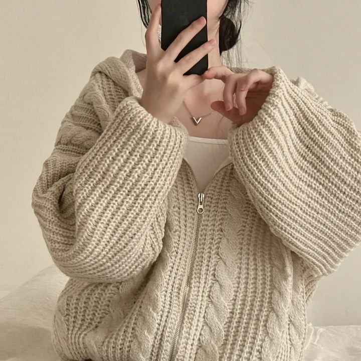 MIKIGA - Oversized kabelgebreide hoodie met rits