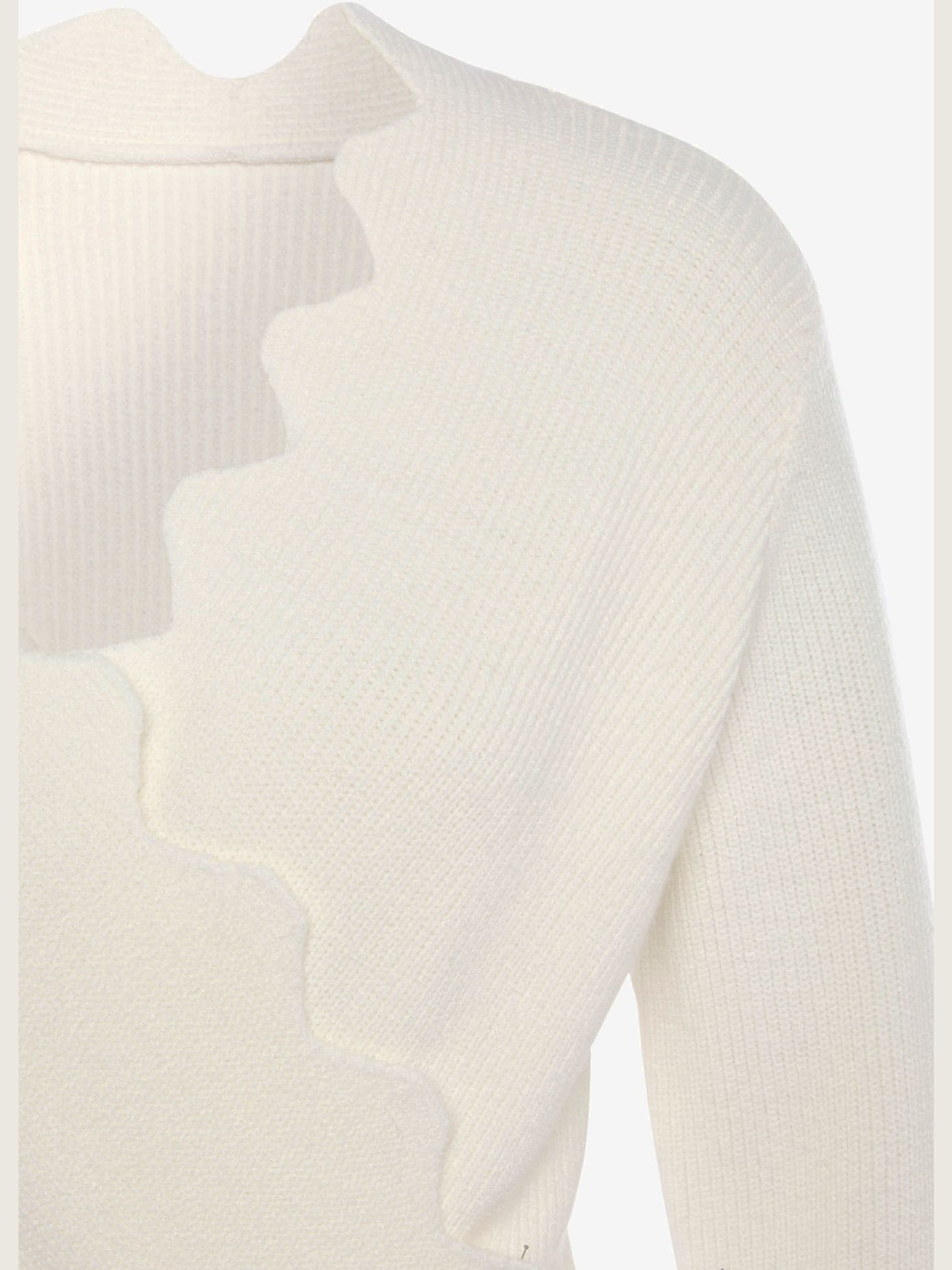 Pull en tricot bord ondulé tendance
