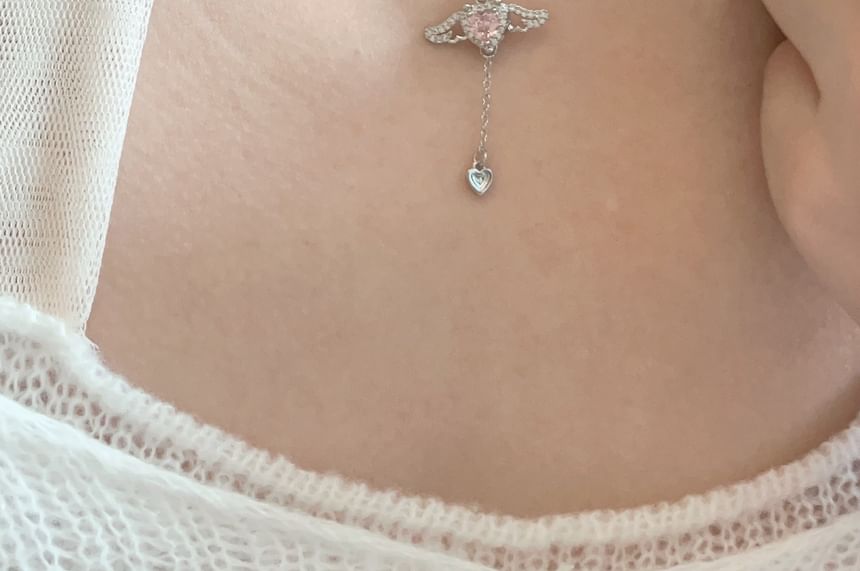 Sharkkira - Oorbel met strik en strasssteentjes / Ketting met harthanger
