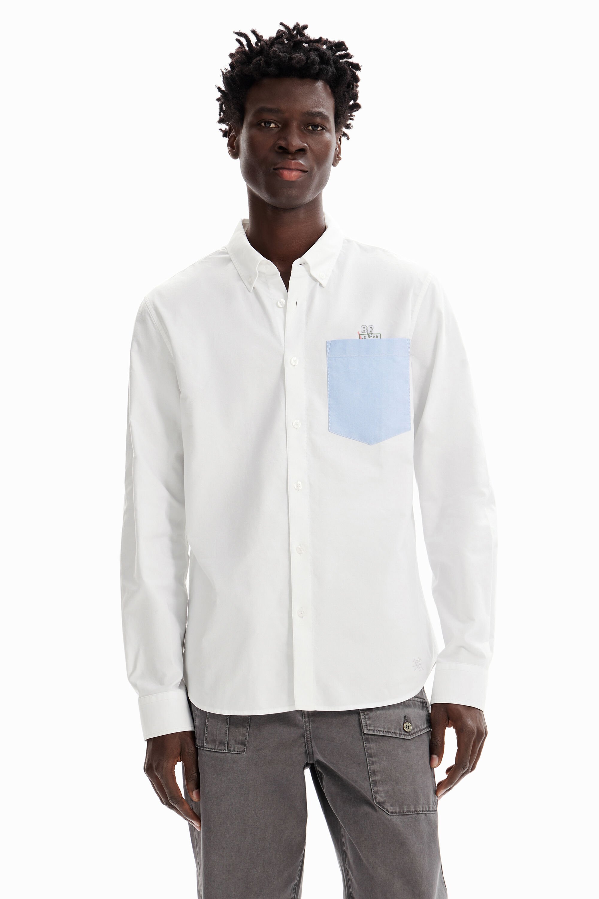 Chemise unie poches