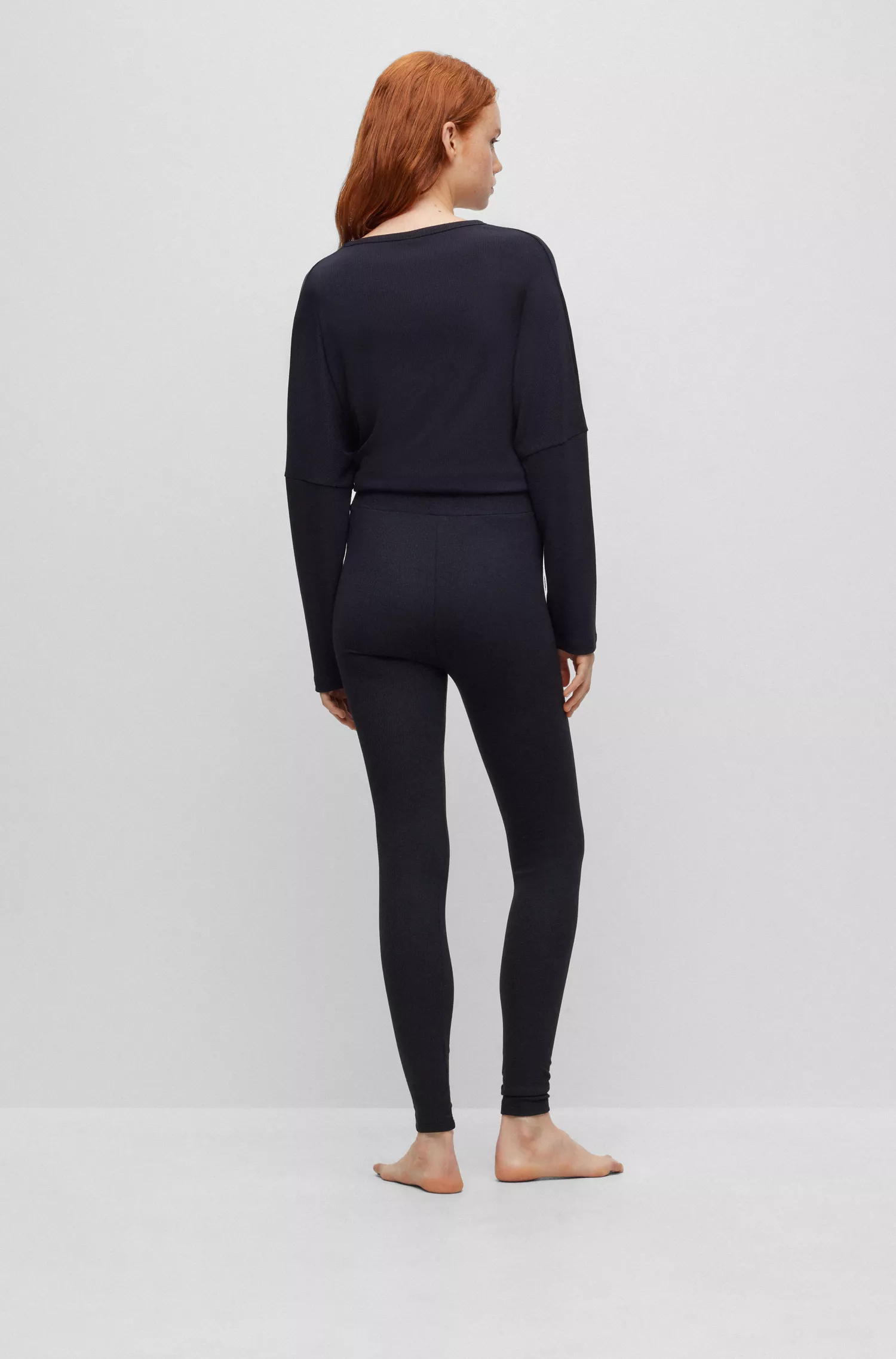 Calça legging de pijama HUGO vermelha, modelagem skinny, com cós com logo.