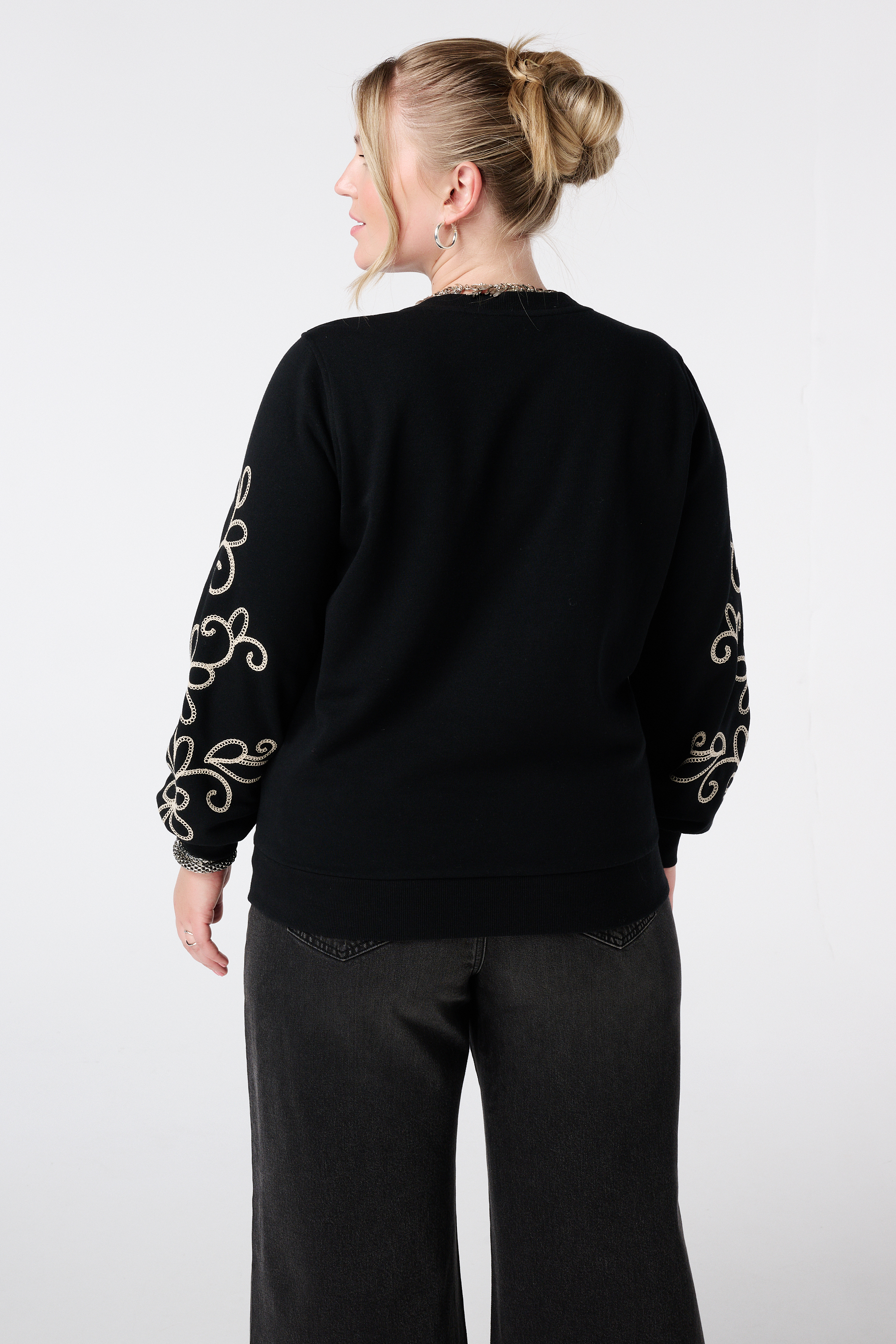 Sweater met broderie details Zwart