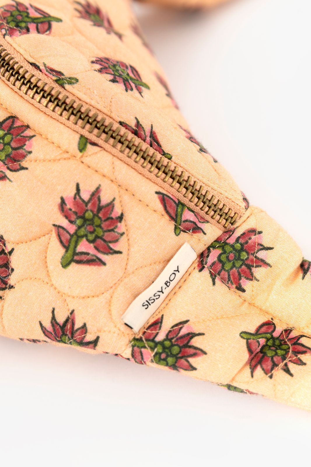 Zacht oranje doorgestikte crossbody tas met print