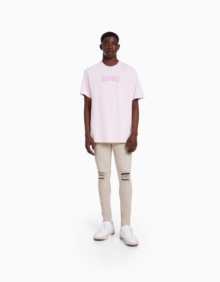 calça jeans super skinny rasgada