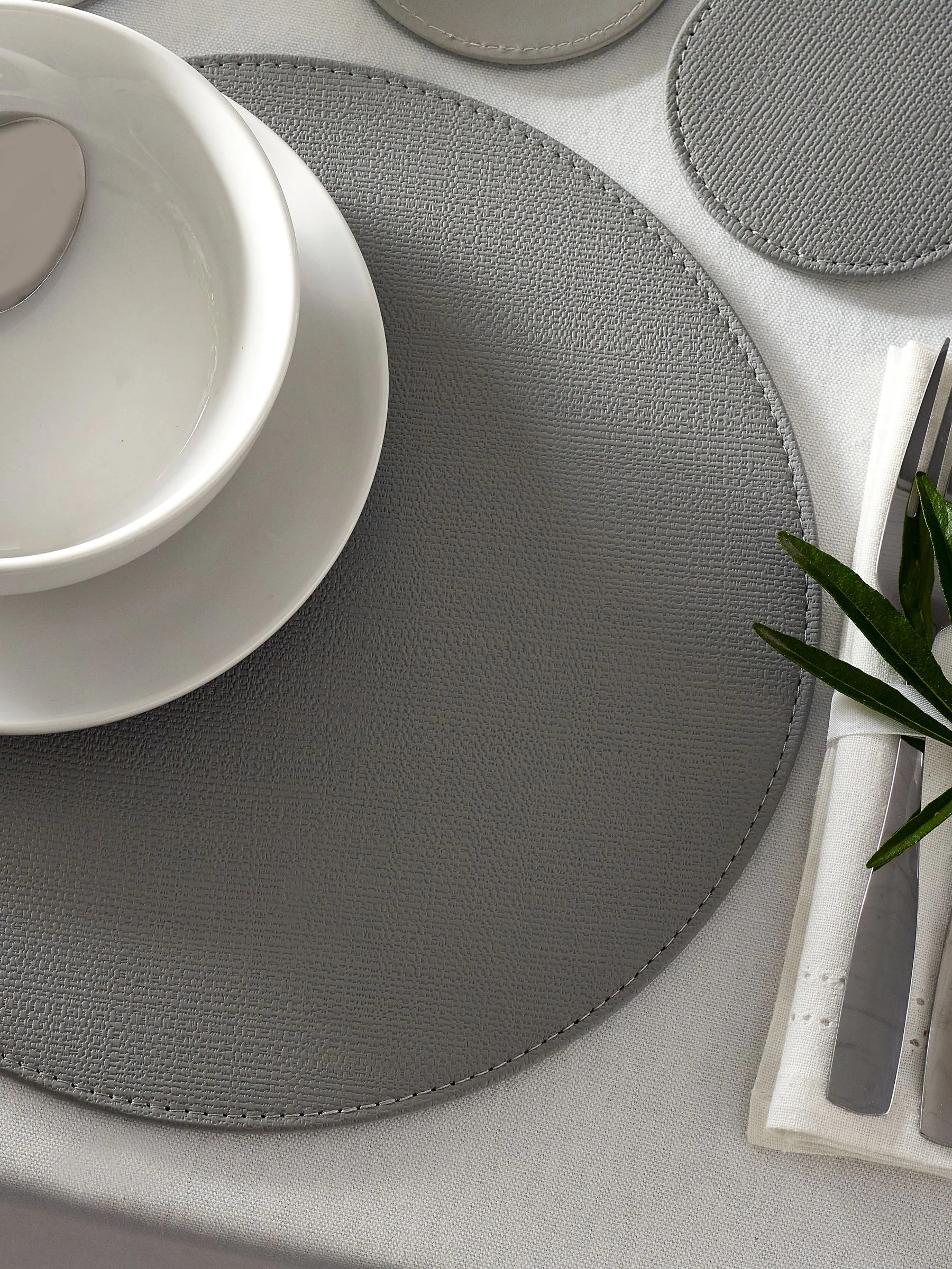 Set van 4 omkeerbare placemats en onderzetters van imitatieleer