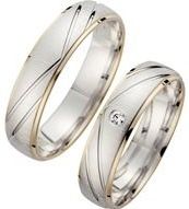 Trouwringen wit en geel goud met Diamant breedte 5 mm