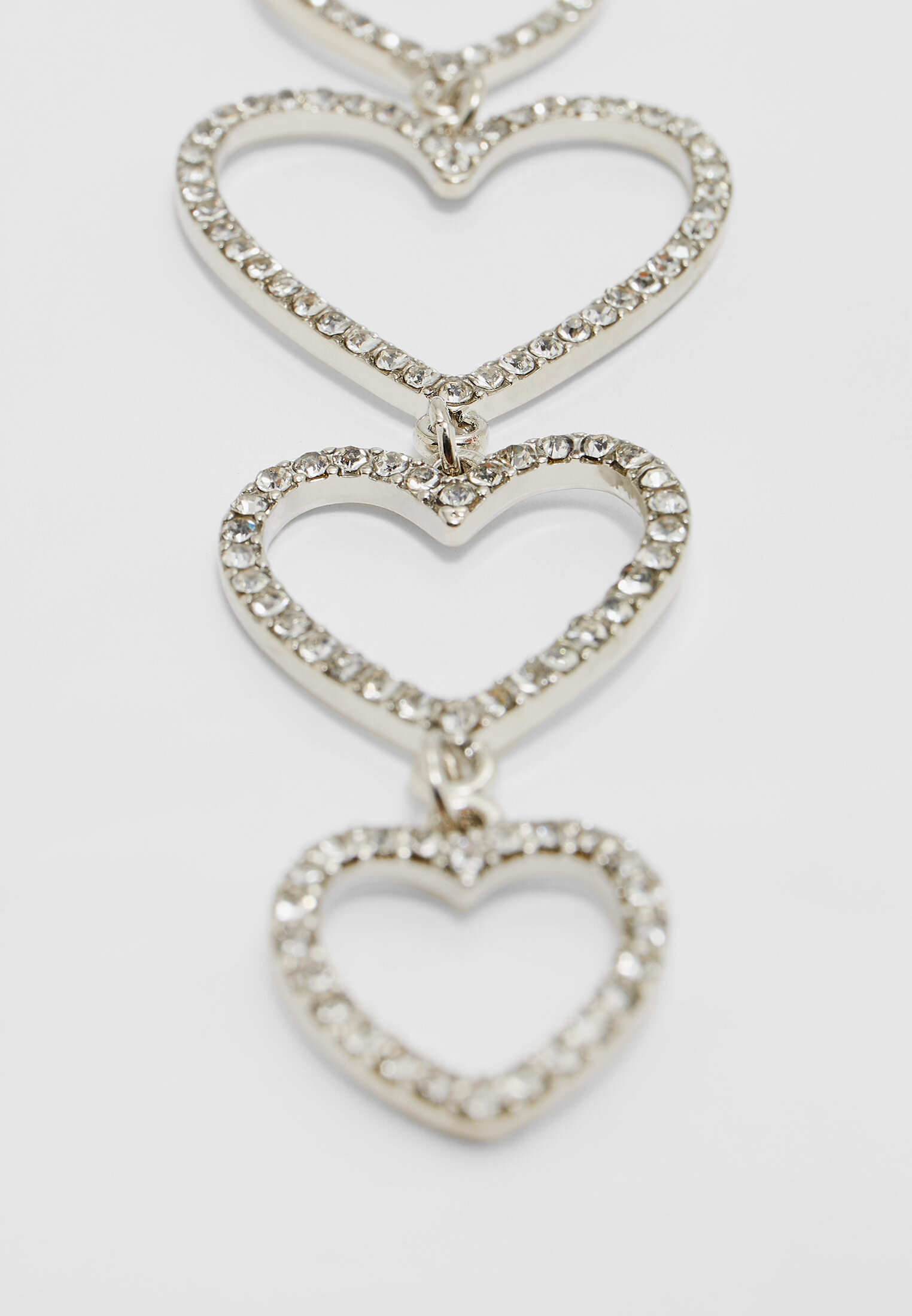 Brincos de coração com strass