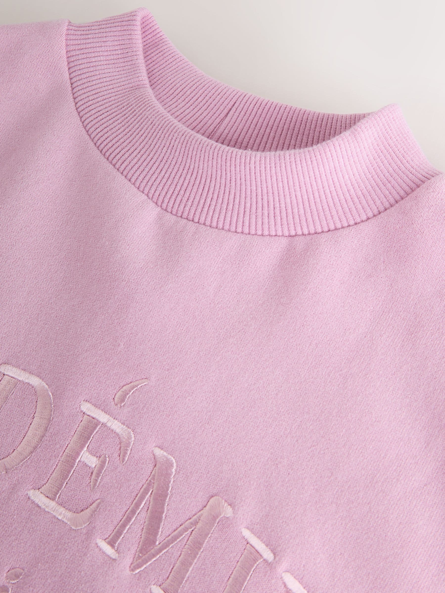 Roze met slogan - Set van sweatshirt en joggingbroek met wijde pijpen (3-16jr)