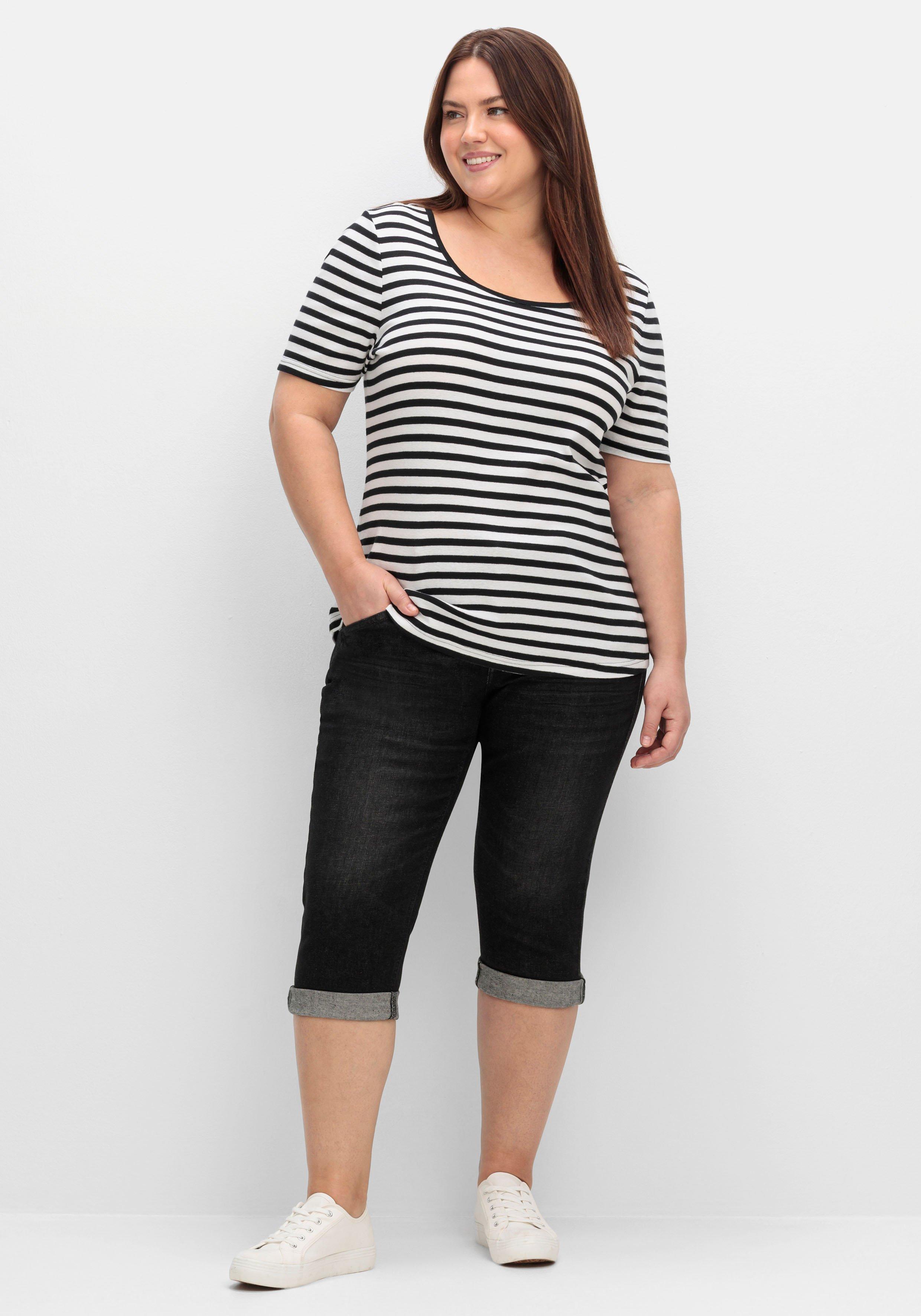 Schmale Caprijeans mit Used-Effekten