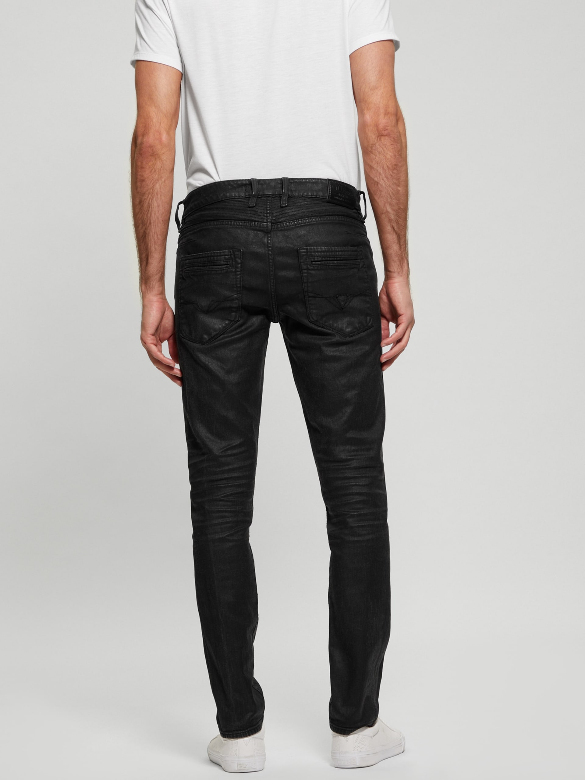 Calça jeans Finnley revestida, corte slim e afunilado.