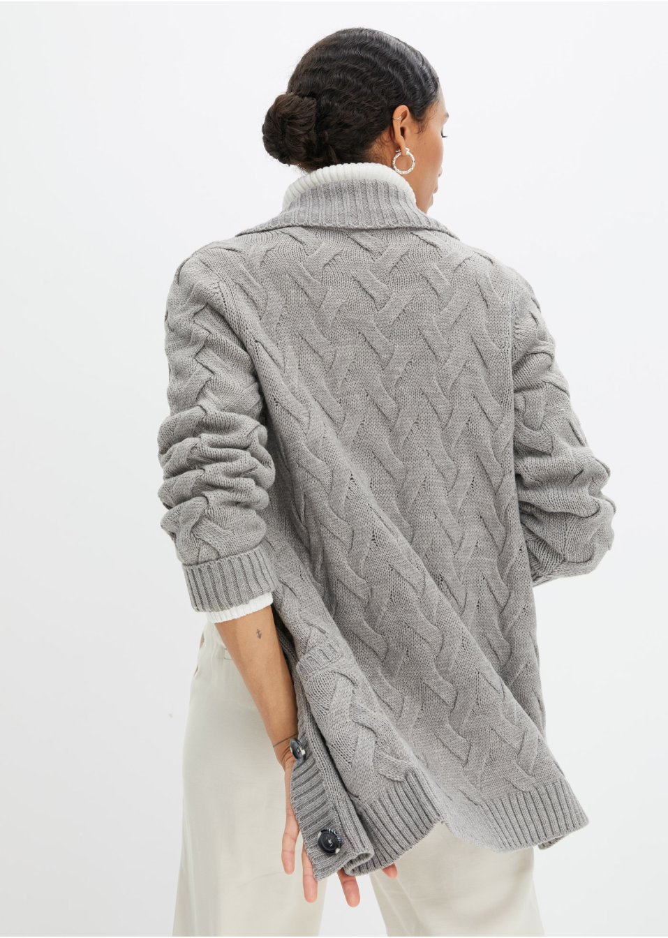 Gilet en maille à col châle et motif torsadé
