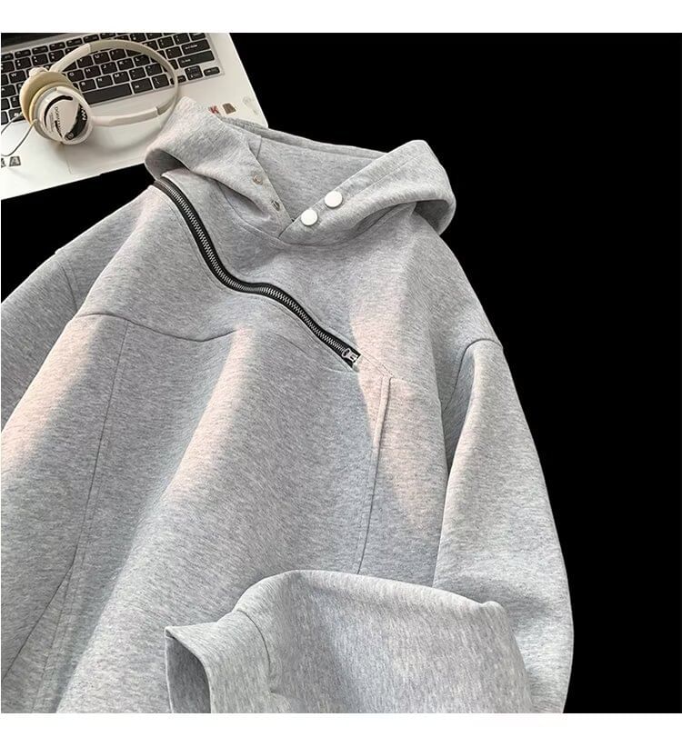 Femilina - Asymmetrische hoodie met ritsaccent