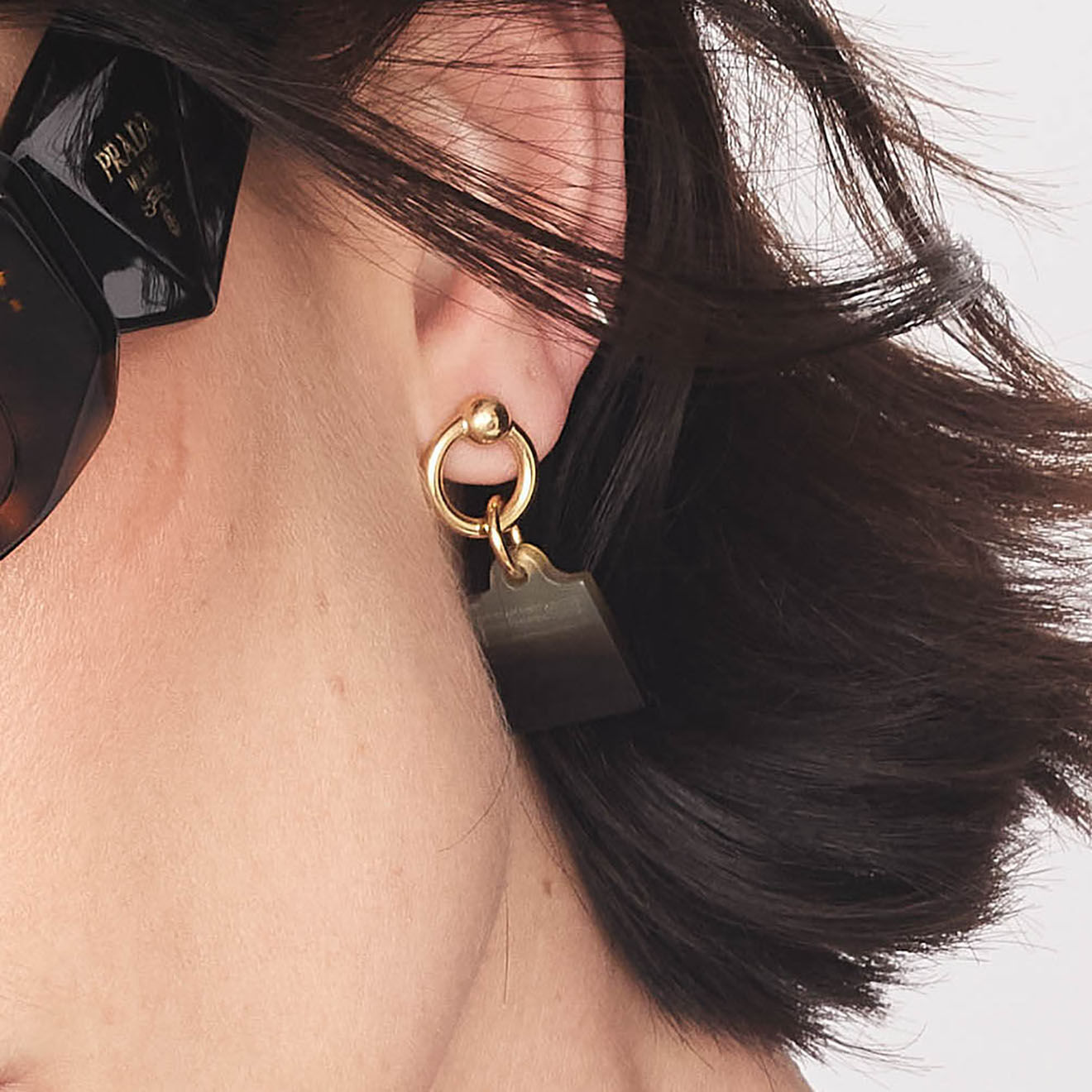 Hermès Boucles d'oreilles en Laiton doré/marron - Parfait état