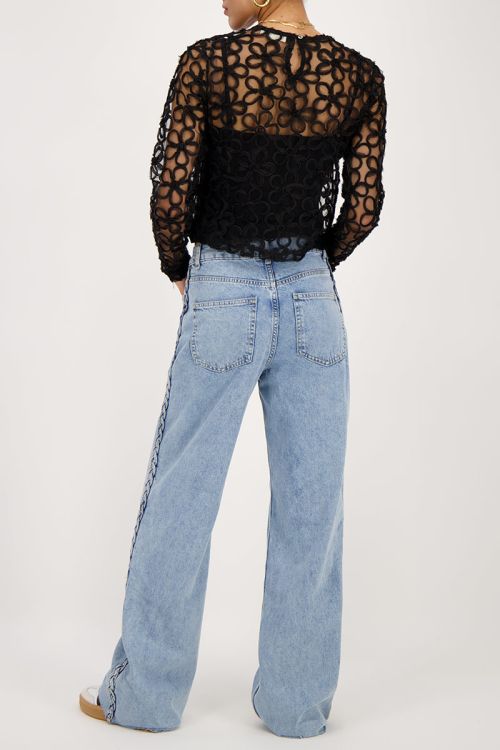 Blauwe jeans met vlecht detail
