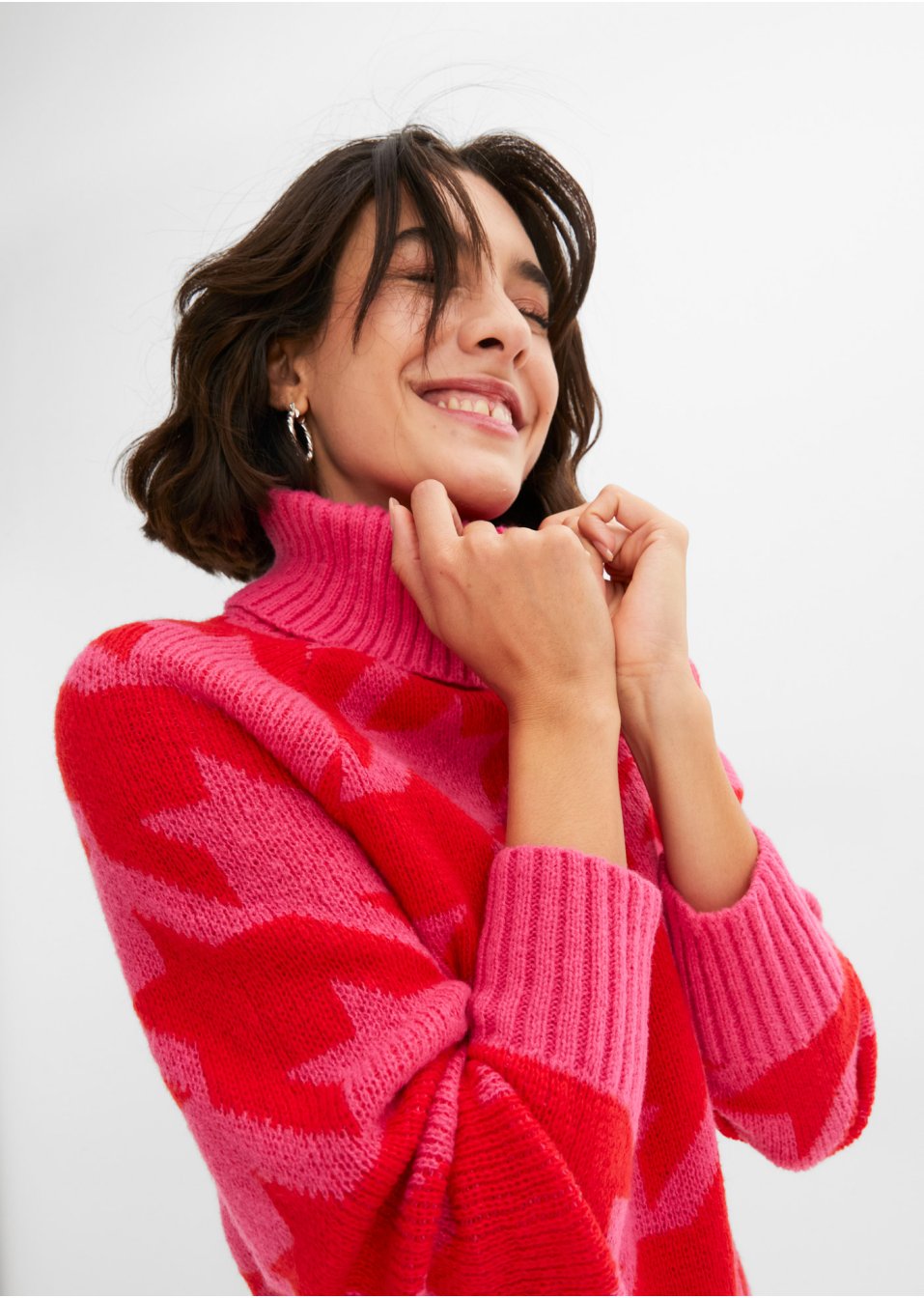 Pull col roulé à motif