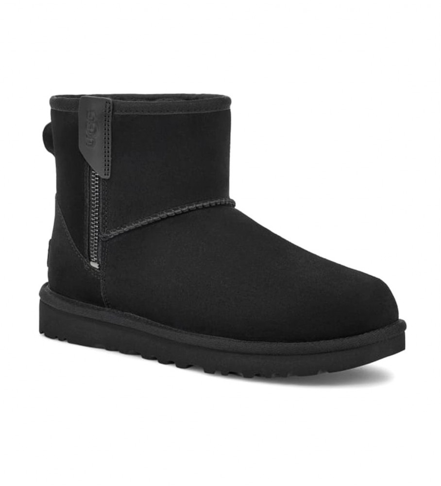 Botas UGG pretas clássicas mini Bailey de couro.