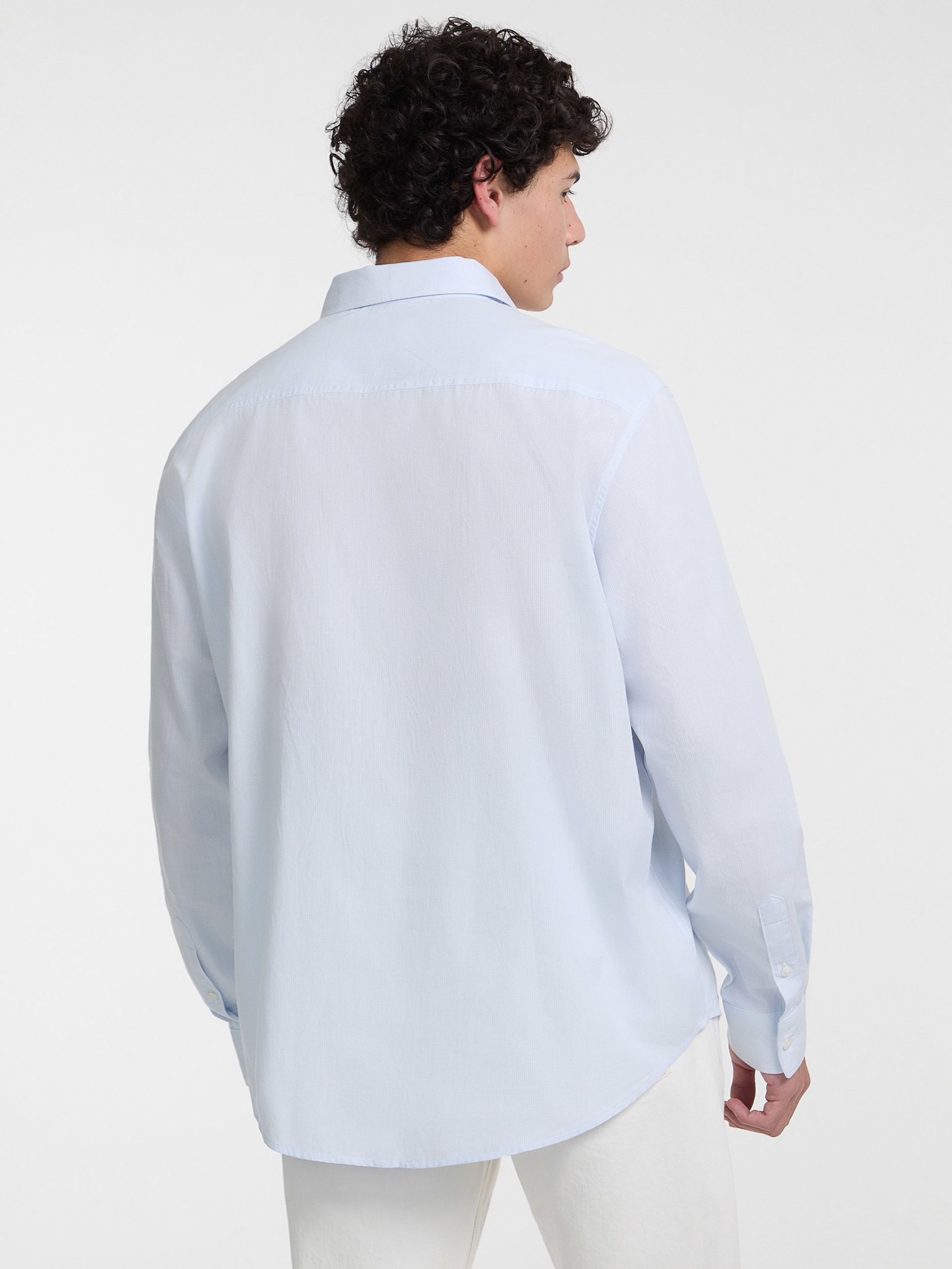 Camisa listrada com bolso