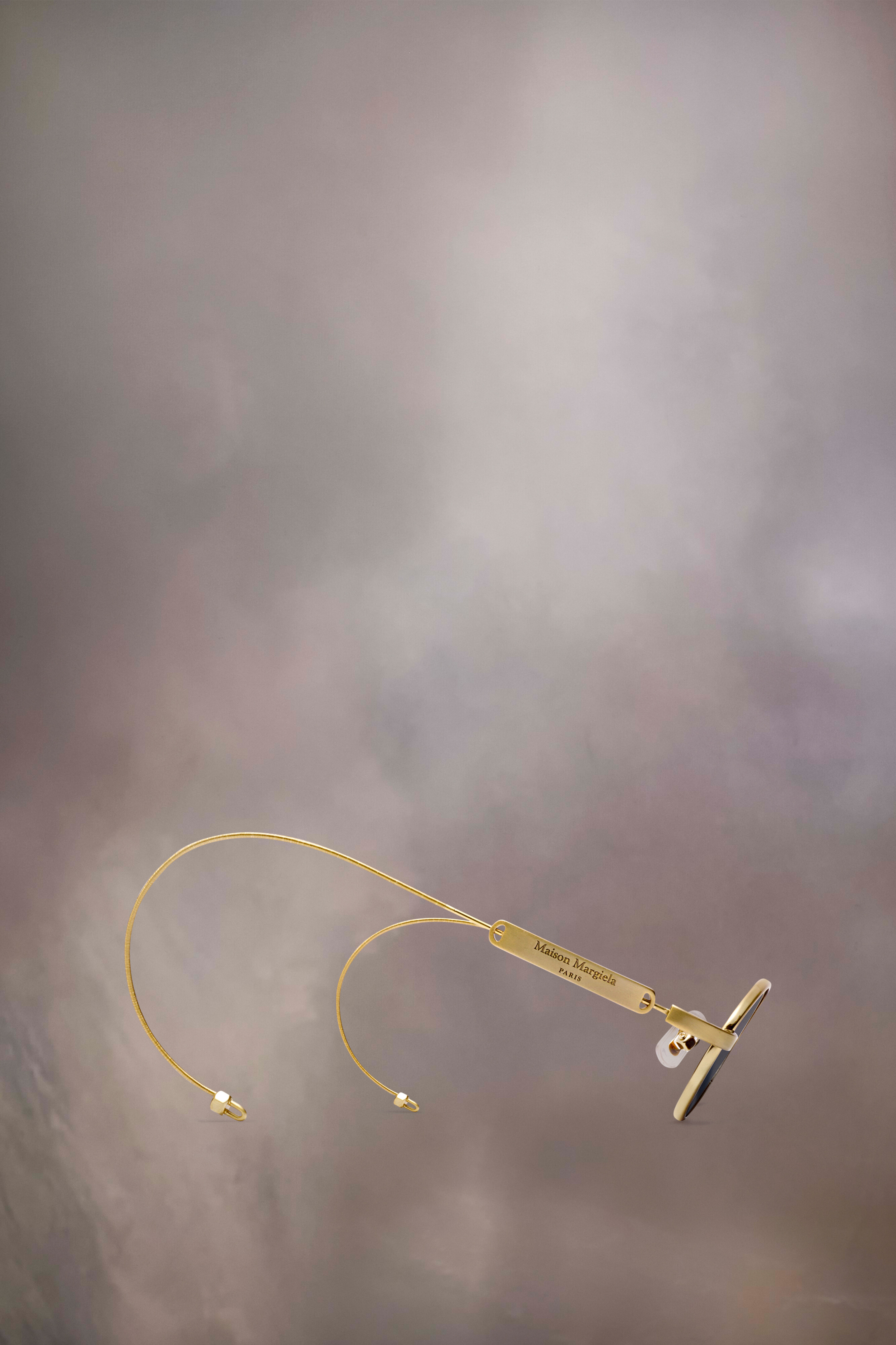 Lunettes de soleil ovales dorées x Gentle Monster​