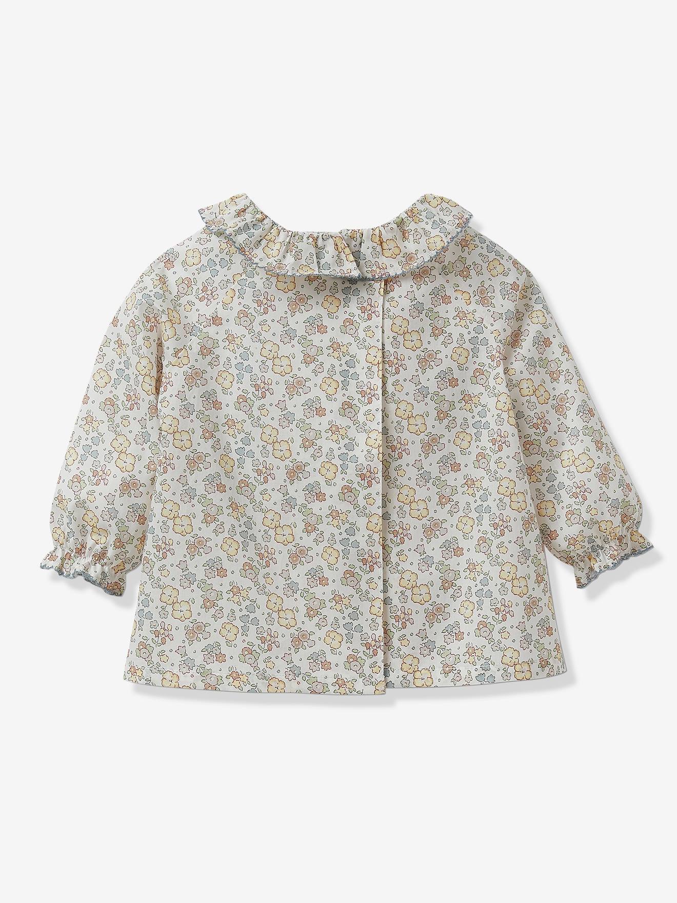 Blusa infantil Cyrillus em tecido Liberty com estampa branca clara.