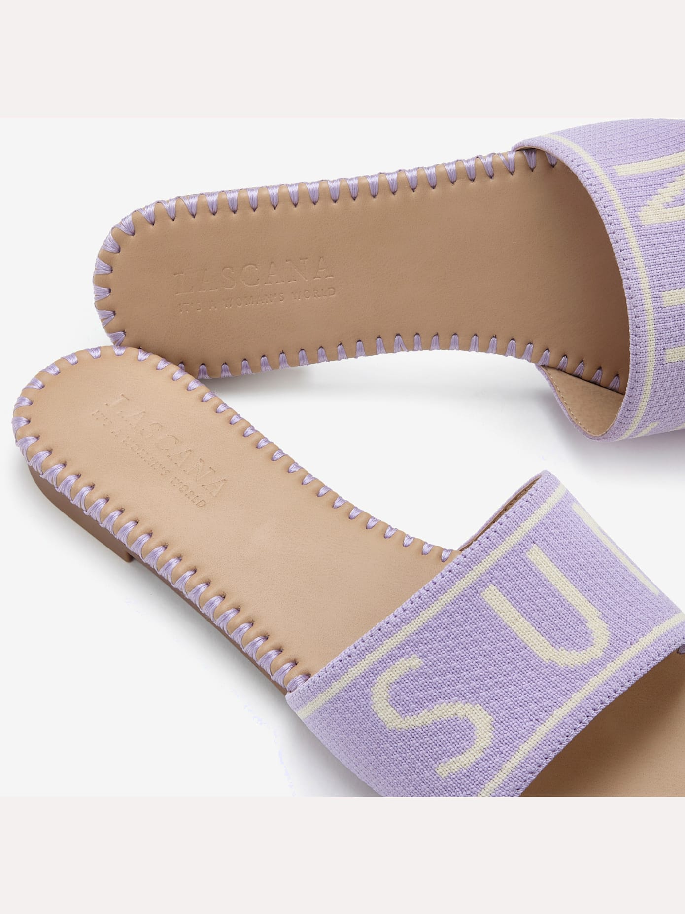 Jolies mules avec inscription et design tendance