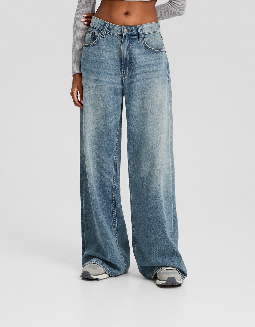 calça jeans de perna larga