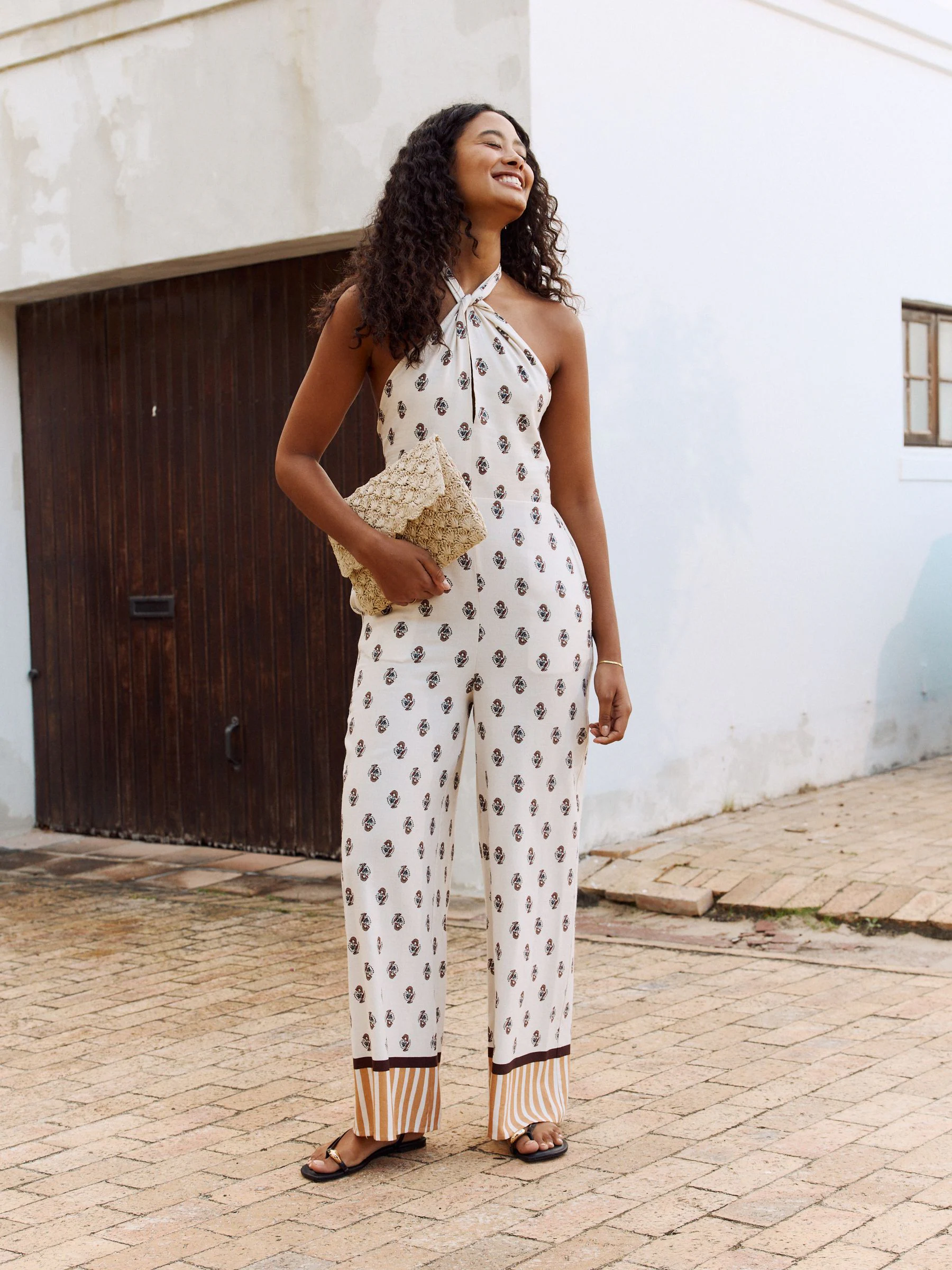 Crème - Wijduitlopende jumpsuit met halterhals
