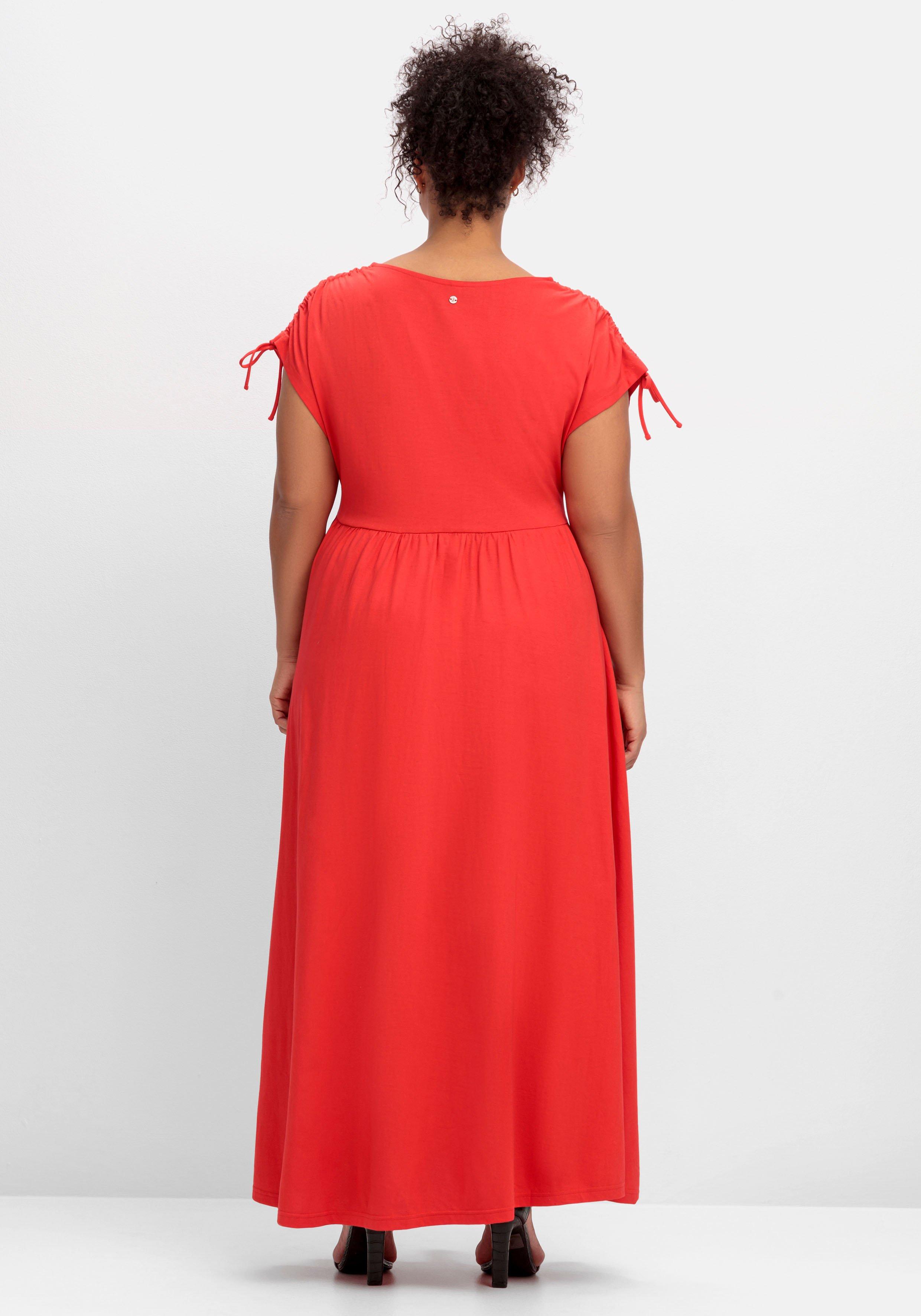 Jerseykleid mit weitem Rock und V-Ausschnitt