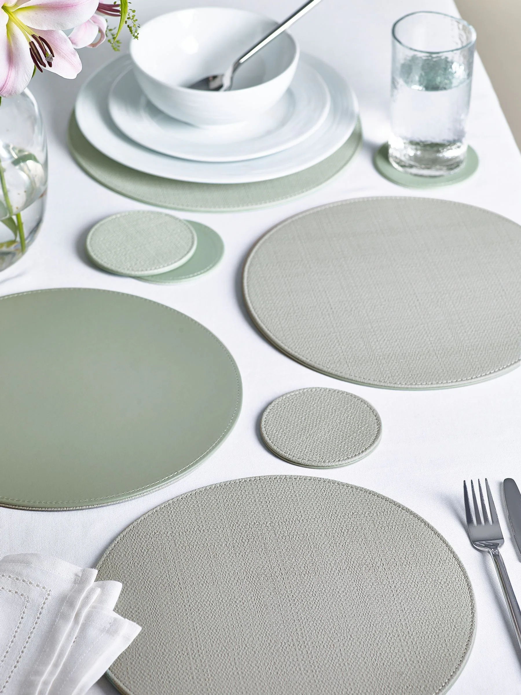 Set van 4 omkeerbare placemats en onderzetters van imitatieleer