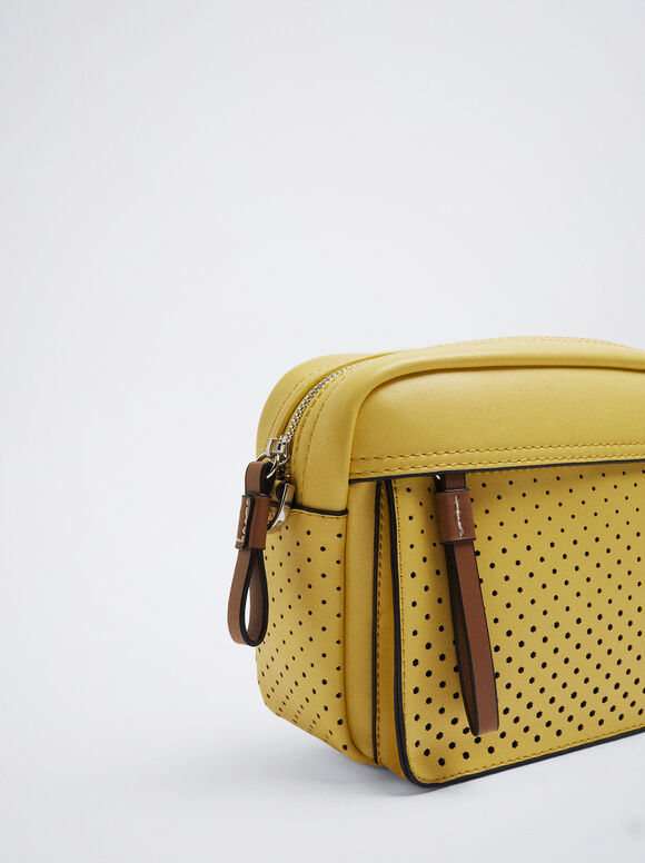 Bolsa transversal com detalhe perfurado - Amarela
