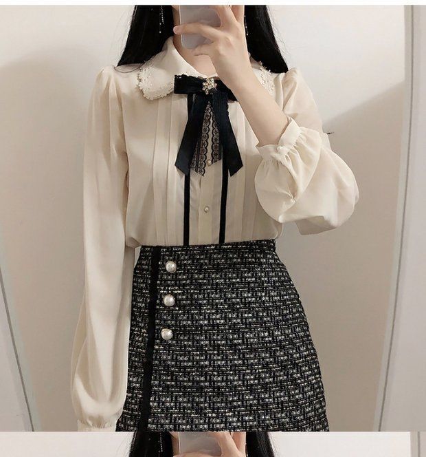 minaga - Blouse met lange mouwen en gestrikte hals