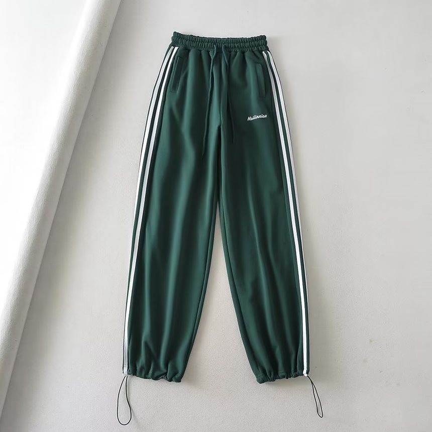 Florentine - Wijde joggingbroek met trekkoord en letters